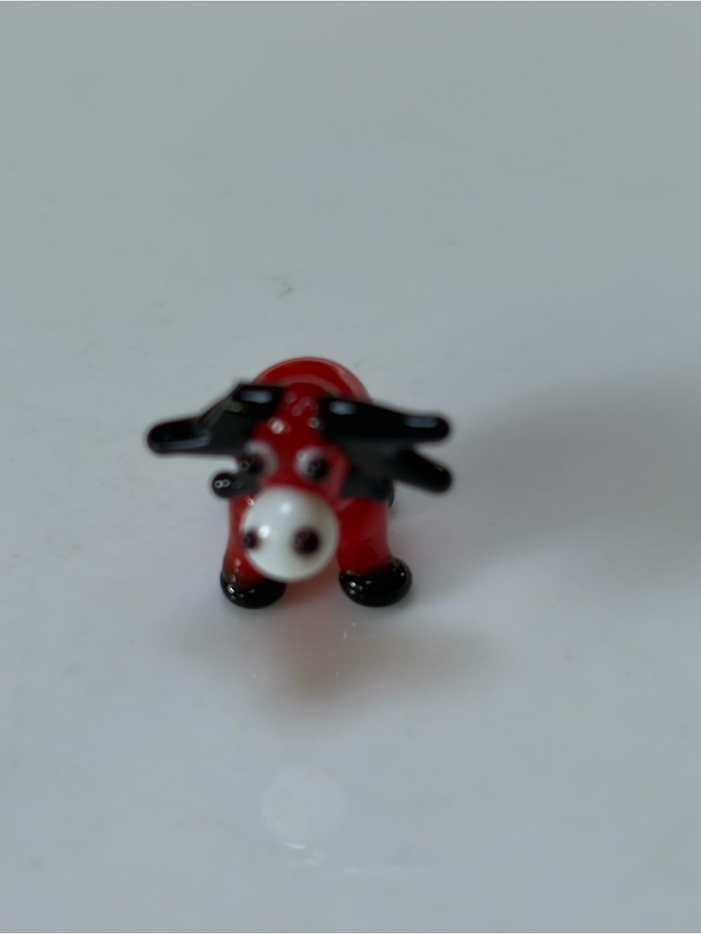 Miniature Red Glass Moose Figurine with Black Accents